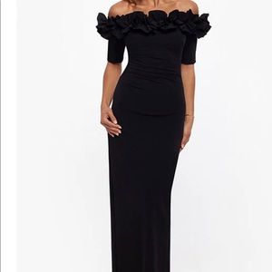 Black evening gown by Xscape size 14P is no longer available online or in stores